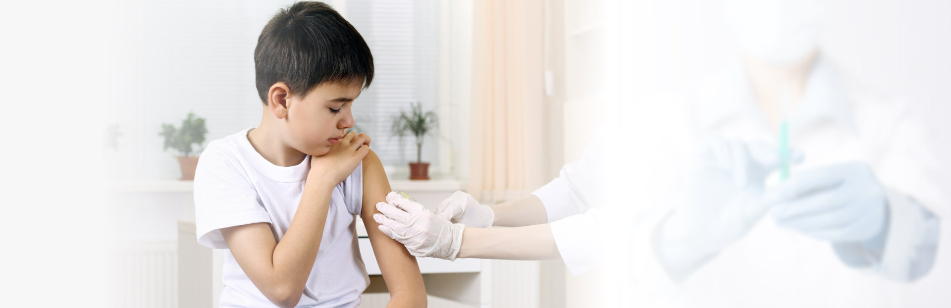 young boy having a vaccination